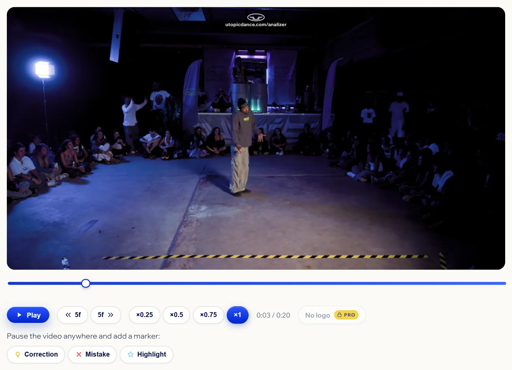 Analizer with a video open: the UTOPIC stamp, the timeline, the speed controls and the buttons to add a marker.