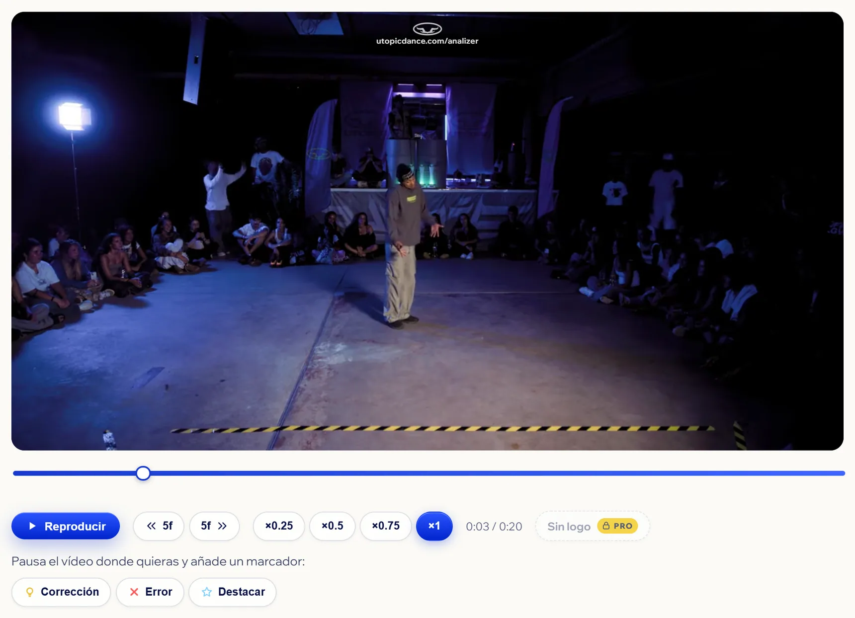 Analizer con un vídeo abierto: el sello de UTOPIC, la línea de tiempo, la velocidad y los botones para añadir un marcador.