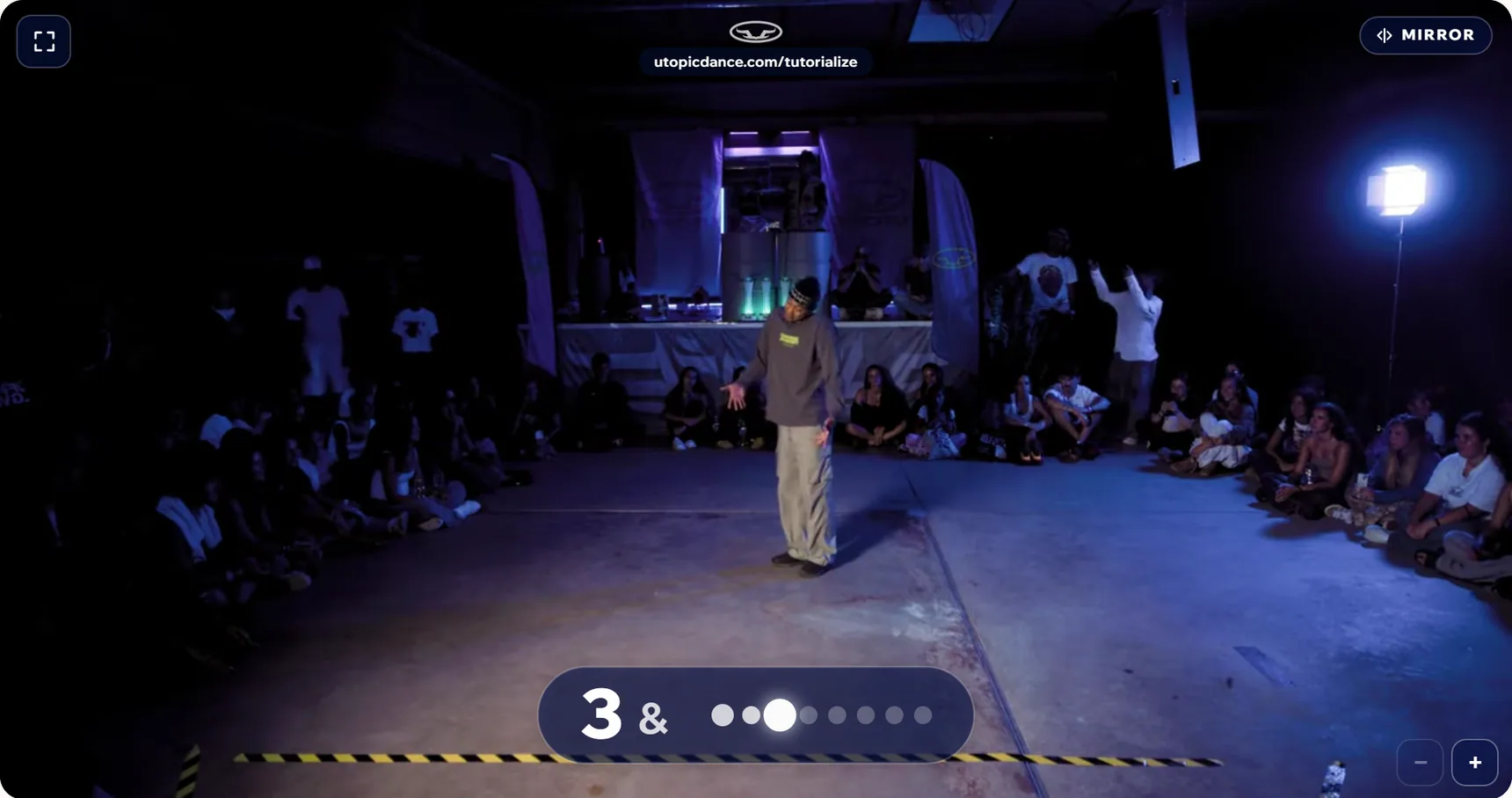 The mirrored video with the mirror badge and the count display: the count number, its «&» and 8 dots showing where you are.